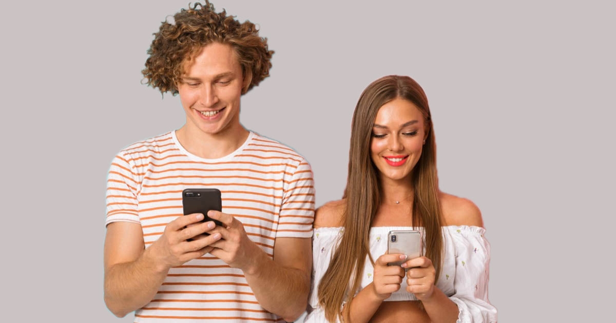 Two friends smiling at their phones after receiving a SOHNAA referral